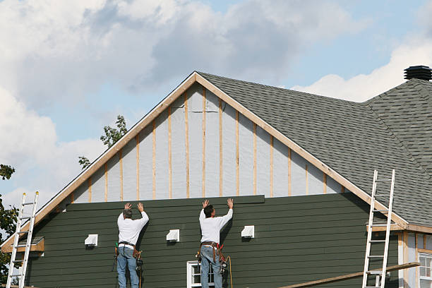 Professional Siding technician working in Lafayette, CO